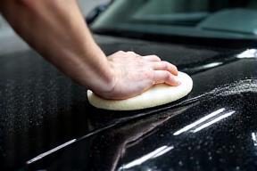 Applying ceramic coating to a sports car